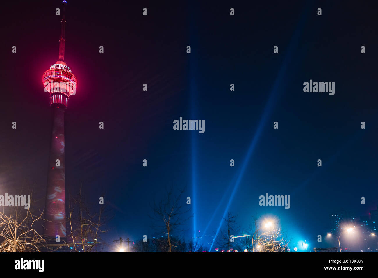 The Central Radio and Television Tower at night with colorful illumination, Beijing, China. Stock Photo