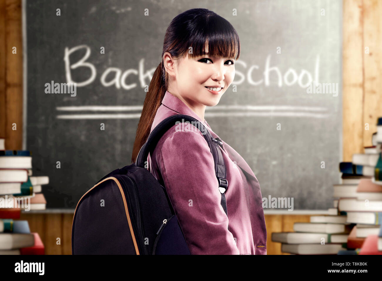 Asian student woman with backpack standing and look back in the ...