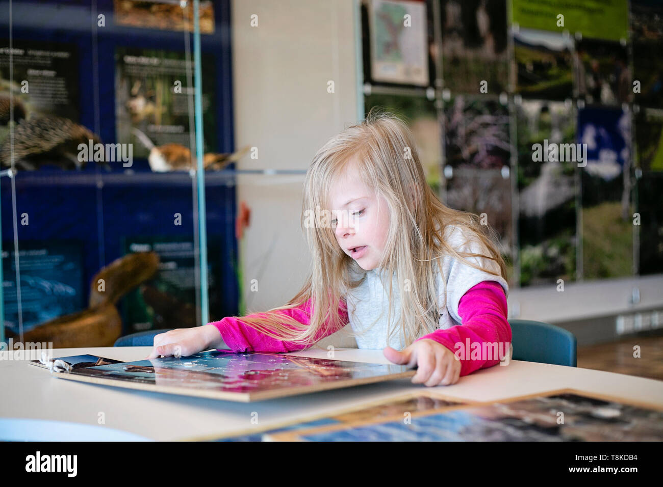 Down Syndrome Girl learning Stock Photo