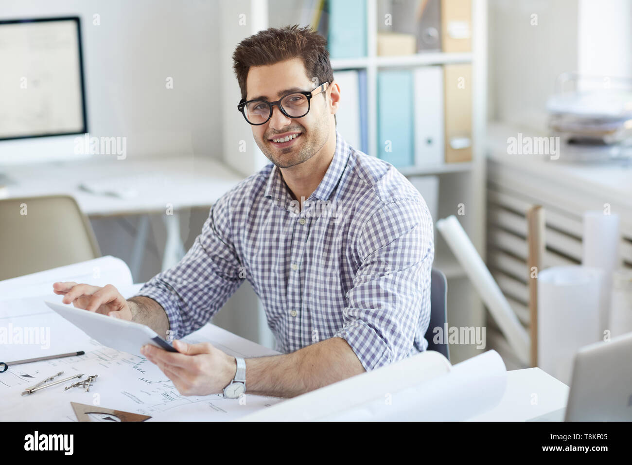 Middle-Eastern Engineer Using Digital Tablet Stock Photo