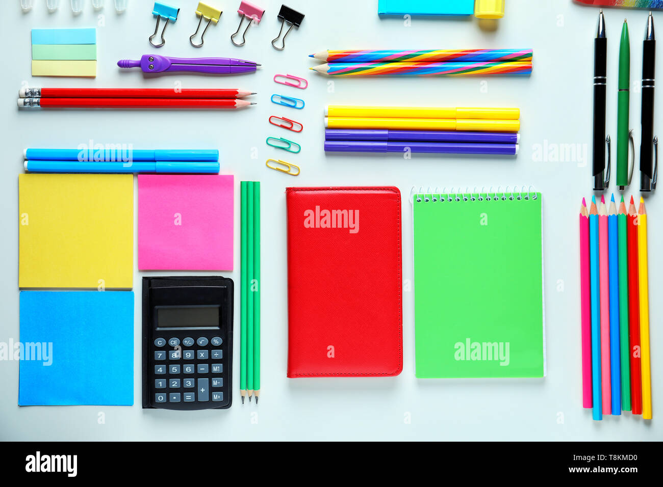 Composition with different school stationery and calculator on white background Stock Photo