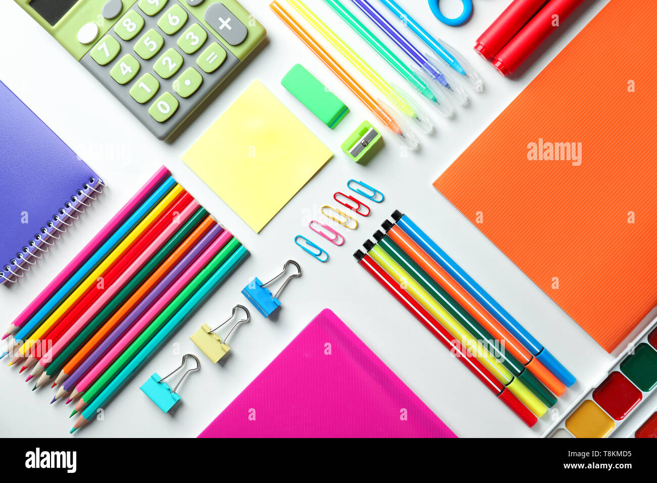 Composition with different school stationery and calculator on white background Stock Photo