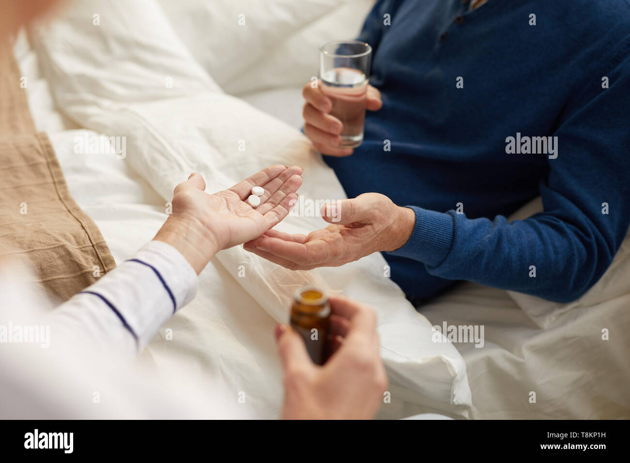 Senior Man Taking Pills Stock Photo