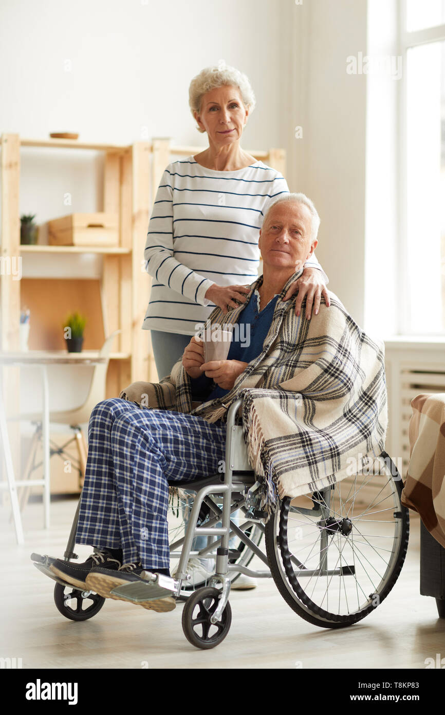 Senior Man in Wheelchair with Wife Stock Photo Alamy