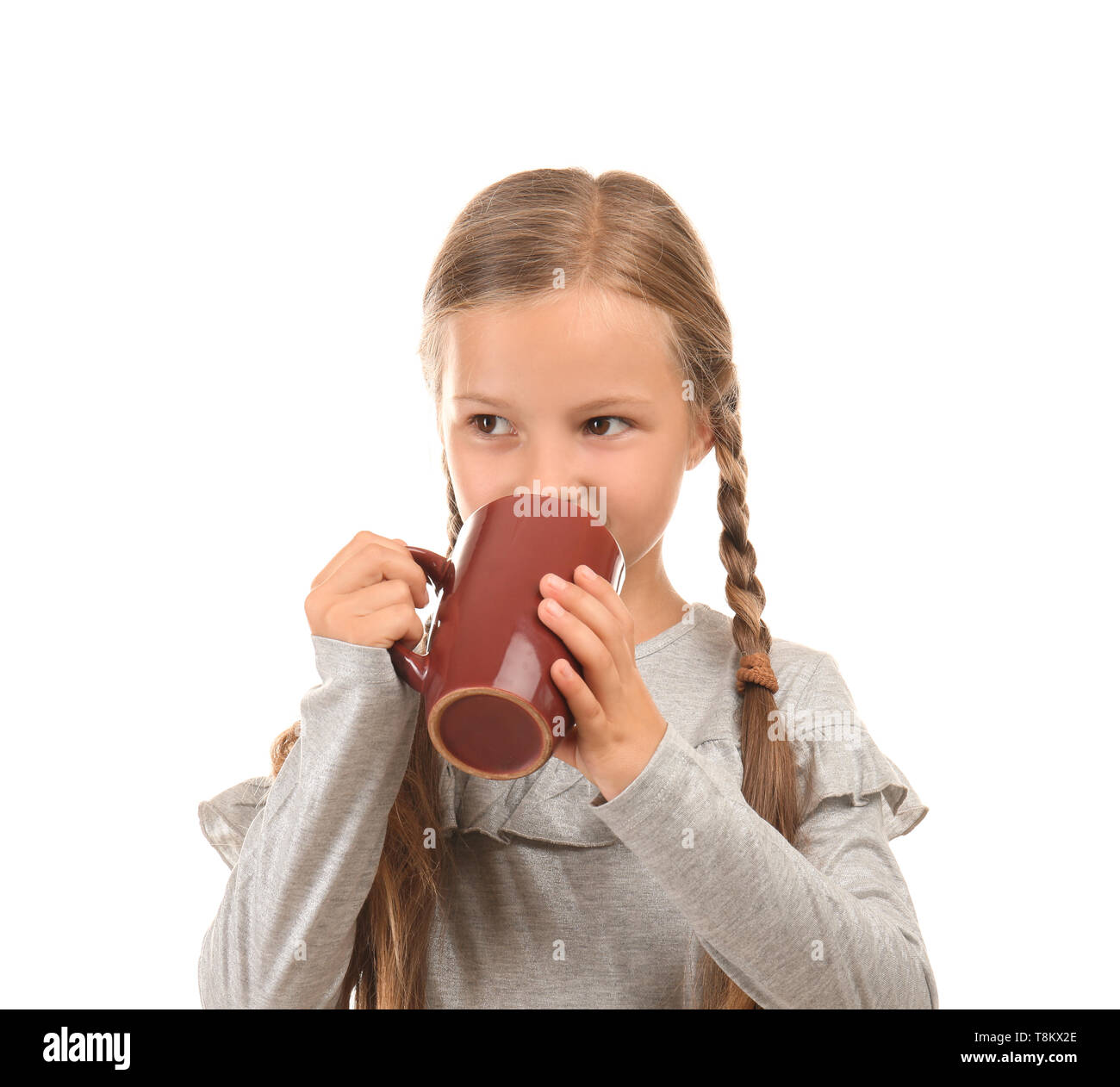 https://c8.alamy.com/comp/T8KX2E/cute-little-girl-with-cup-of-hot-chocolate-on-white-background-T8KX2E.jpg