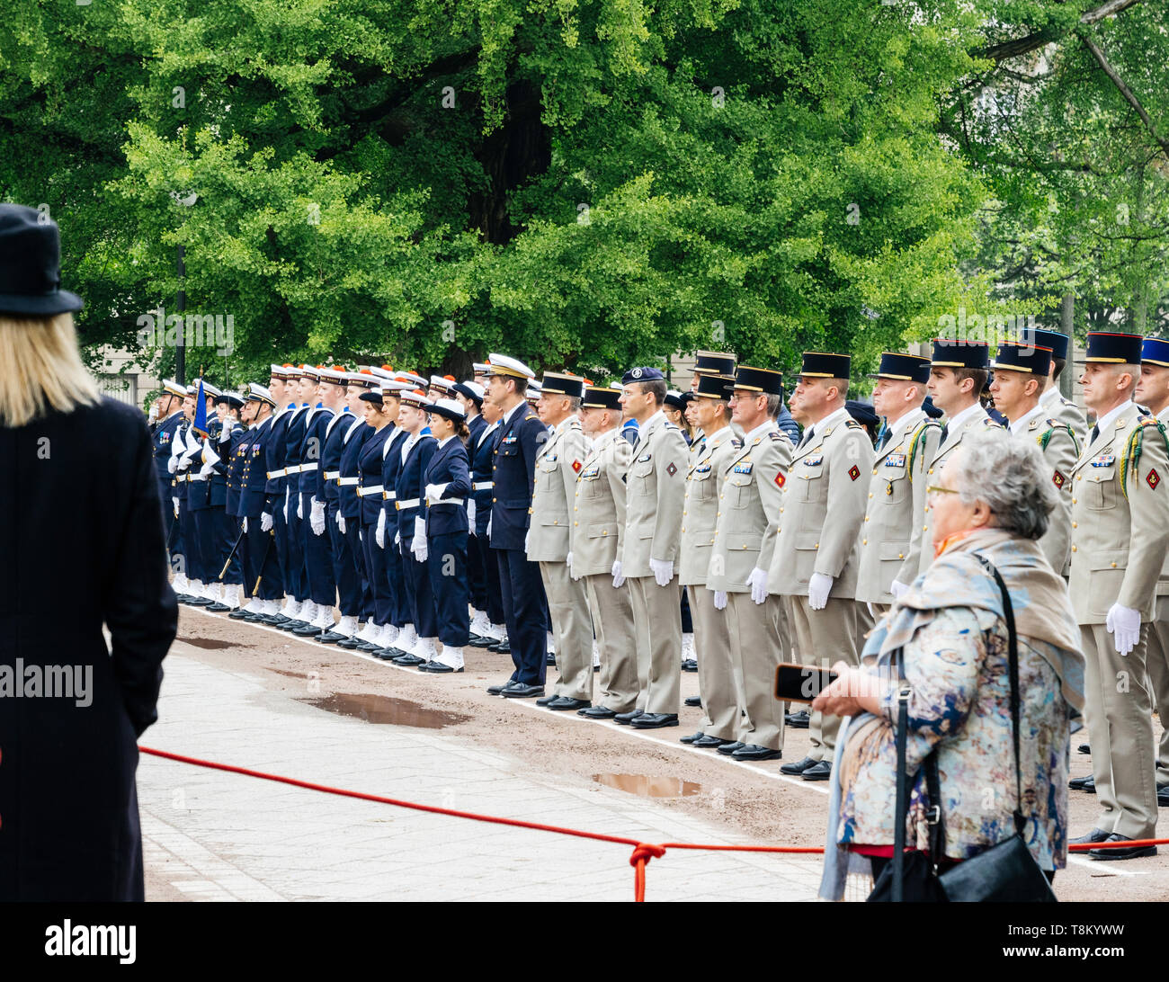 STRASBOURG, FRANCE - MAY 8, 2017: Side view of large group of military personnel at ceremony to mark Western allies World War Two victory Armistice in Europe victory over Nazi  Stock Photo