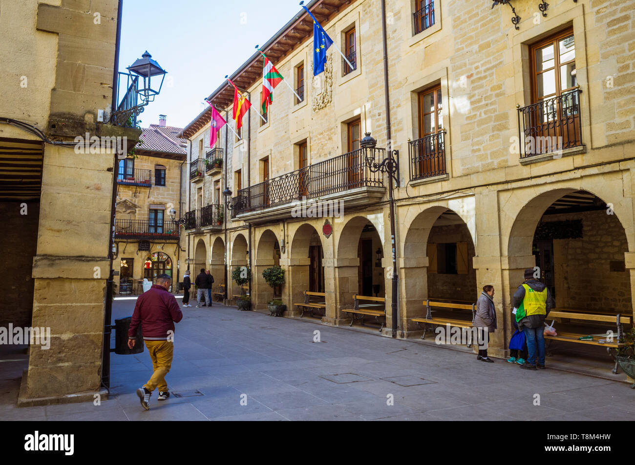 Laguardia, Álava province, Basque Country, Spain : People at the Plaza Mayor square with both the new and the old townhall of the historic town of Lag Stock Photo