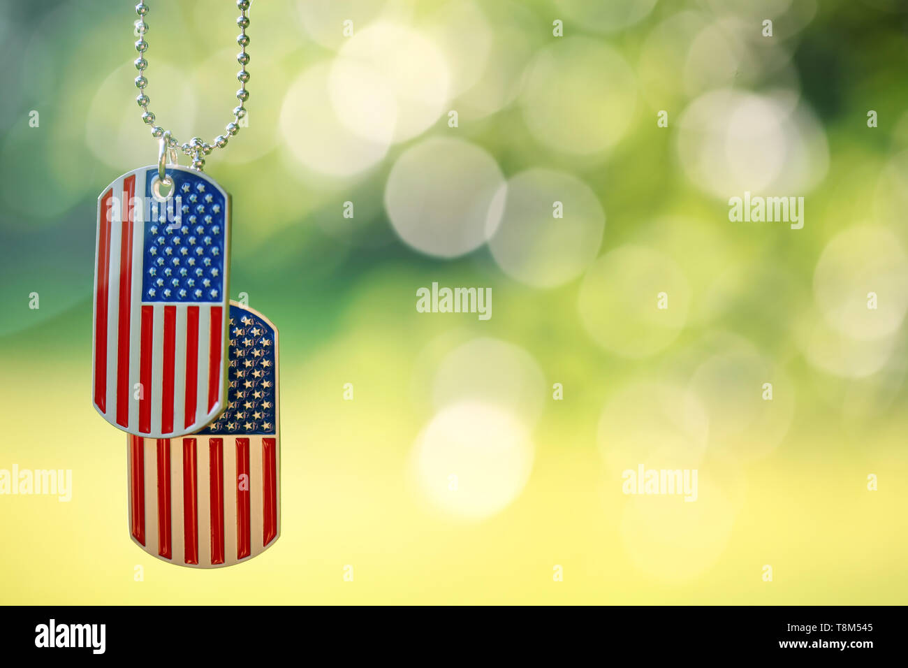 American flag dog tags hanging outside Stock Photo