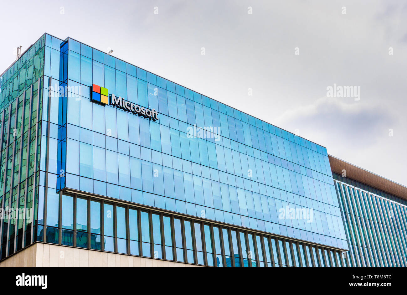 Exterior view of Microsoft Corporation logo on glass windowed West side