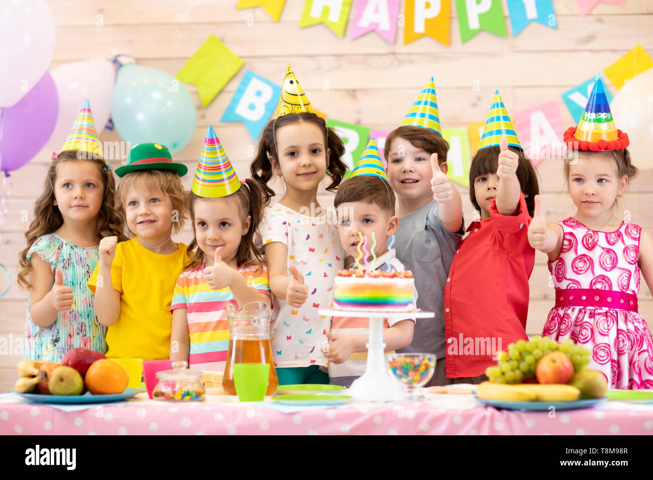 Group Of Preschool Children Having Fun Celebrating Birthday Party