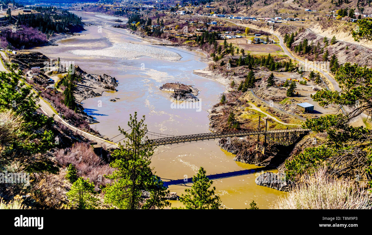 View of The Old Bridge, a single lane bridge over the Fraser River at the town just north of the town of Lillooet, British Columbia, Canada Stock Photo