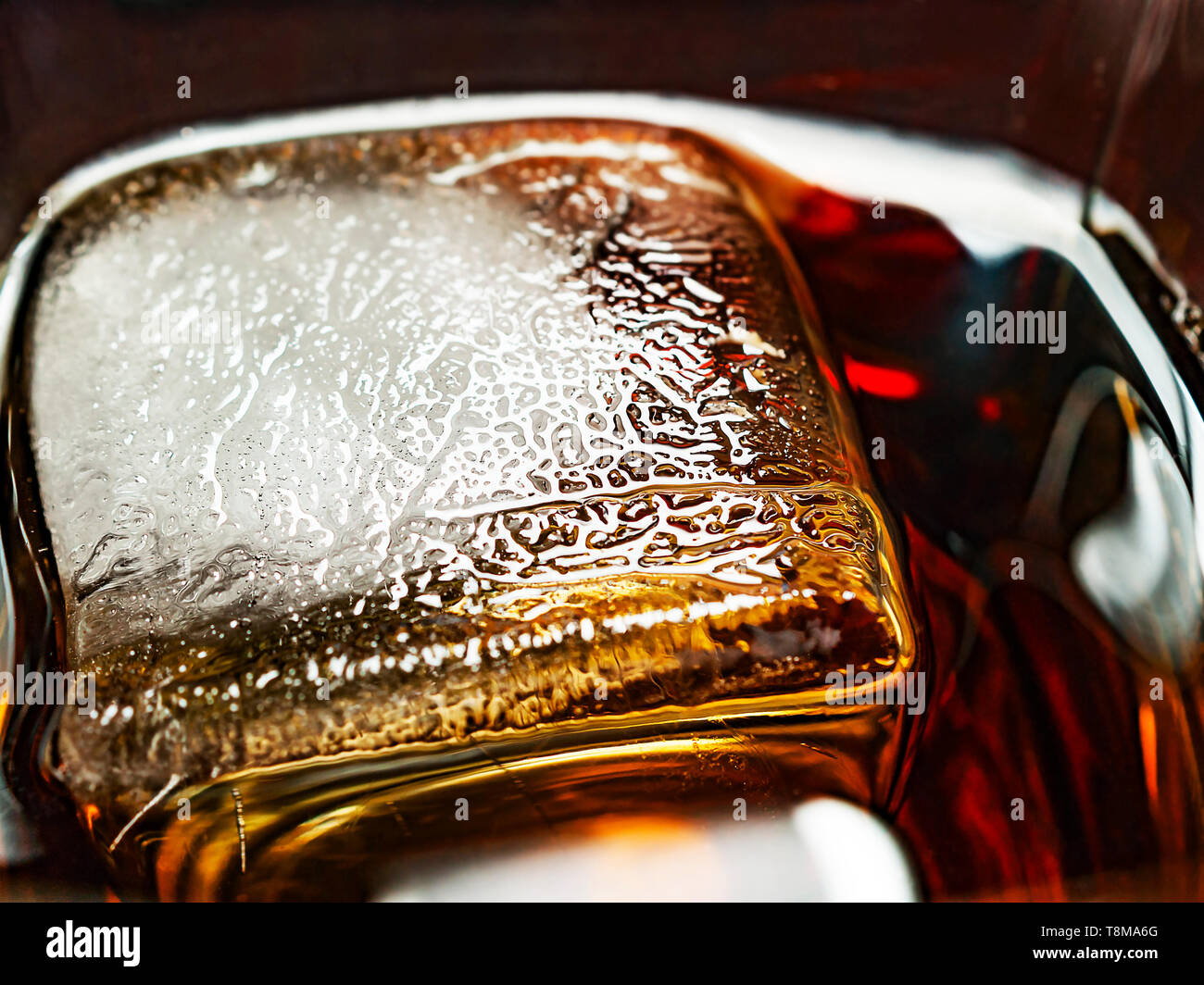 Big Ice Cube in a Glass of Whiskey and Coke Drink. Ice Texture Details Stock Photo Alamy