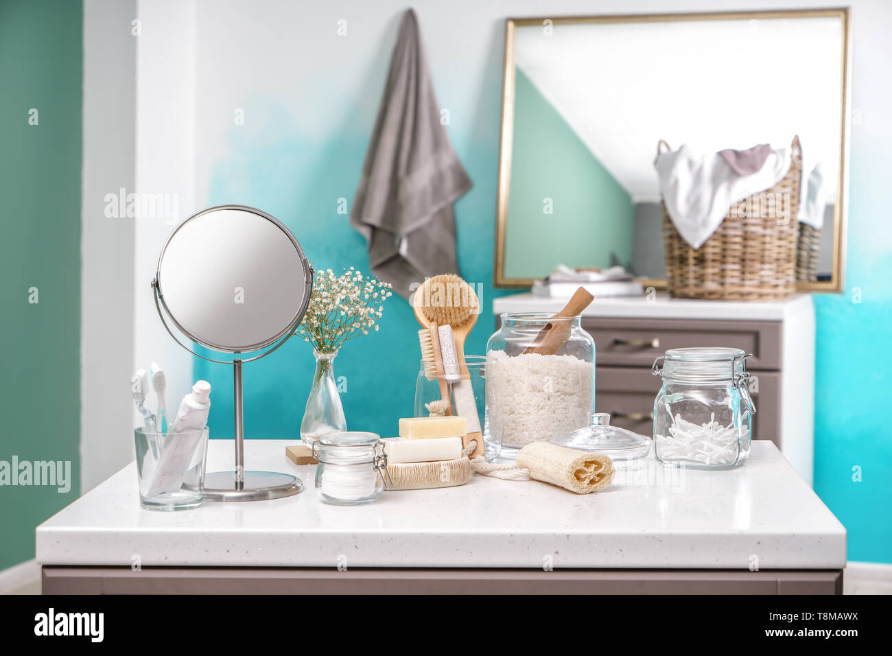 Body care accessories on table in bathroom Stock Photo Alamy