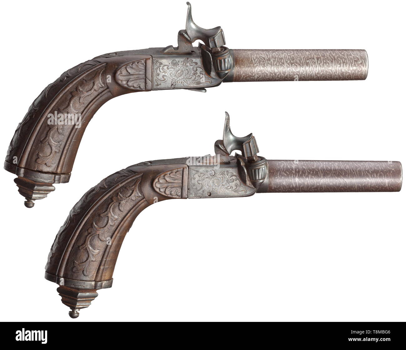 A pair of French pocket pistols, circa 1850 Unscrewable, rifled Damascus barrels in 10.5 mm calibre. Percussion locks with engraved and burnished, somewhat pitted lock housings. Carved grips with chiselled pommels. Length 19 cm. historic, historical, civil handgun, civil handguns, handheld, gun, guns, firearm, fire arm, firearms, fire arms, weapons, arms, weapon, arm, 19th century, Additional-Rights-Clearance-Info-Not-Available Stock Photo