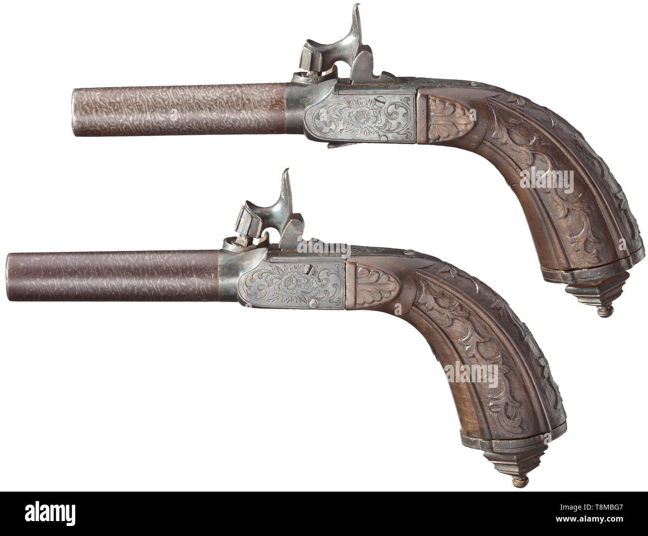 A pair of French pocket pistols, circa 1850 Unscrewable, rifled Damascus barrels in 10.5 mm calibre. Percussion locks with engraved and burnished, somewhat pitted lock housings. Carved grips with chiselled pommels. Length 19 cm. historic, historical, civil handgun, civil handguns, handheld, gun, guns, firearm, fire arm, firearms, fire arms, weapons, arms, weapon, arm, 19th century, Additional-Rights-Clearance-Info-Not-Available Stock Photo