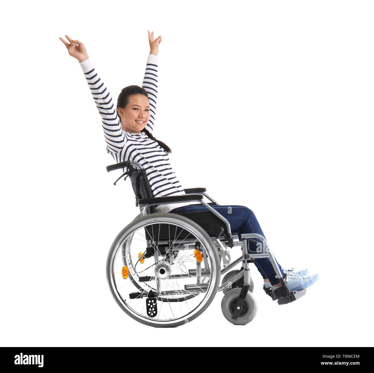 Happy Asian woman in wheelchair on white background Stock Photo - Alamy