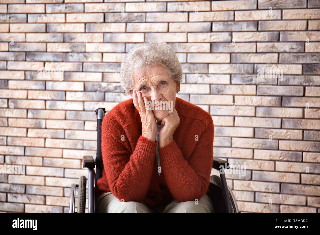 Sad old woman in wheelchair hi-res stock photography and images - Alamy