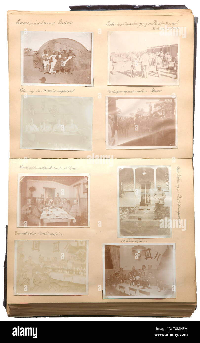 An album in memory of German South-West Africa belonging to Junior Paymaster Döcker in the uniform supply depot of the command in Windhoek and the southern district command in Keetmanshoop, circa 1906 - 1913 A total of more than 270 photographs (mostly in postcard size and larger) in photo mounting corners and on captioned pages of an album with hard cover binding, the front binding torn, the title partly legible 'Erinnerungen aus Deutsch-Südwest-Afrika - Juli...' (tr. 'Memories of German South-West Africa - July...'). With photographs of the fie, Additional-Rights-Clearance-Info-Not-Available Stock Photo