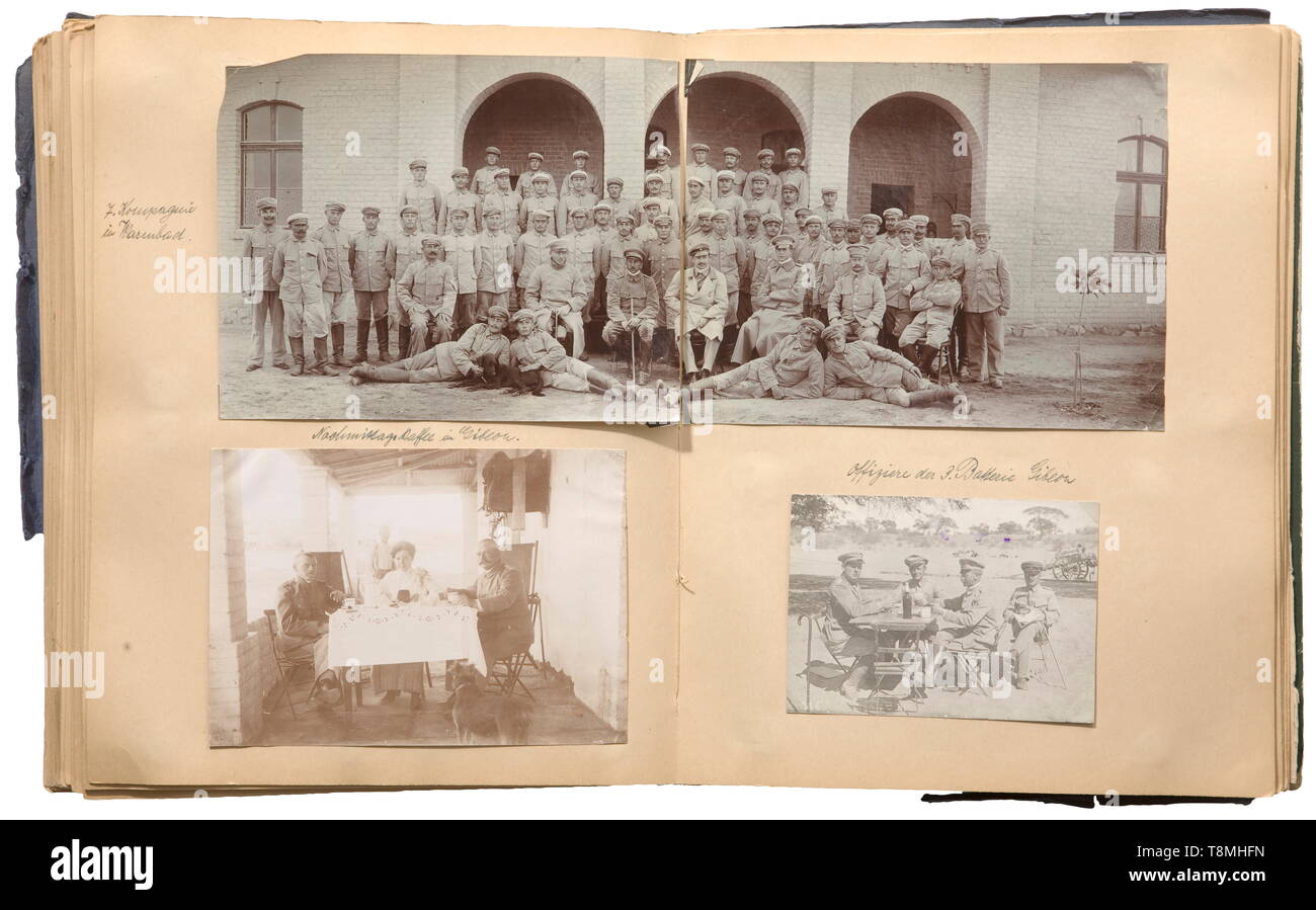 An album in memory of German South-West Africa belonging to Junior Paymaster Döcker in the uniform supply depot of the command in Windhoek and the southern district command in Keetmanshoop, circa 1906 - 1913 A total of more than 270 photographs (mostly in postcard size and larger) in photo mounting corners and on captioned pages of an album with hard cover binding, the front binding torn, the title partly legible 'Erinnerungen aus Deutsch-Südwest-Afrika - Juli...' (tr. 'Memories of German South-West Africa - July...'). With photographs of the fie, Additional-Rights-Clearance-Info-Not-Available Stock Photo