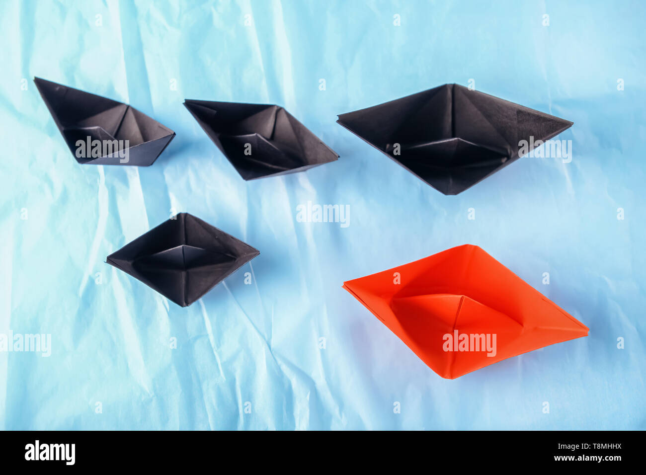 Origami Boats On Color Crumpled Paper Leadership Concept Stock Photo 