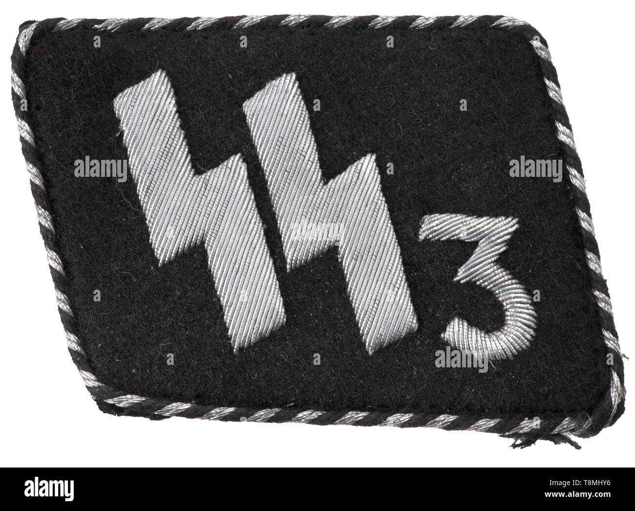 A collar patch for an SS leader of the 3rd SS-Standarte 'Der Führer' Hand-embroidered '3' and SS runes in silver wire thread, continuous black-silver corded trim, the reverse with an SS/RZM-paper tag. historic, historical, 20th century, 1930s, 1940s, Waffen-SS, armed division of the SS, armed service, armed services, NS, National Socialism, Nazism, Third Reich, German Reich, Germany, military, militaria, utensil, piece of equipment, utensils, object, objects, stills, clipping, clippings, cut out, cut-out, cut-outs, fascism, fascistic, National Socialist, Nazi, Nazi period, Editorial-Use-Only Stock Photo