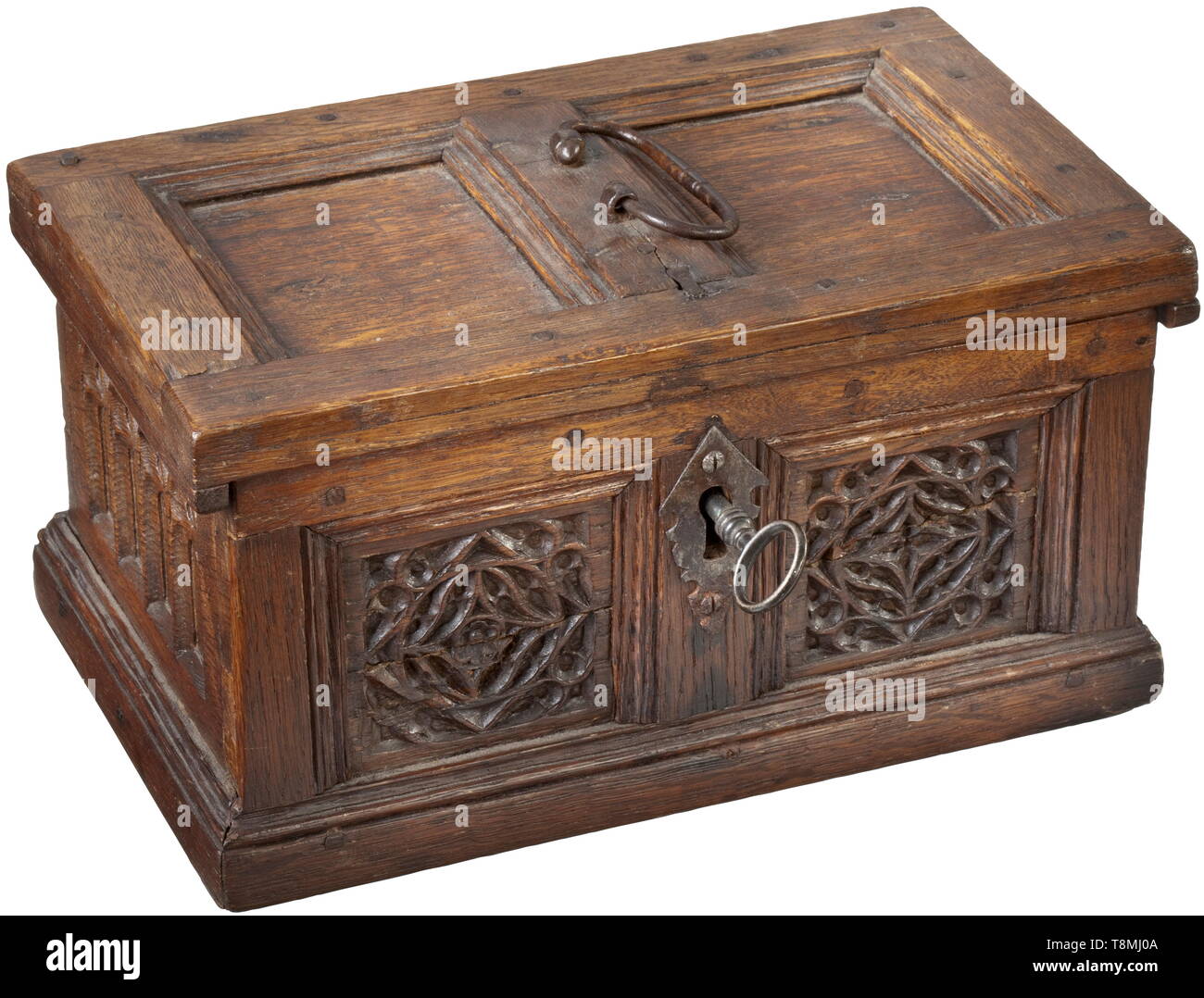 A late Gothic Rhenish casket, circa 1540 Oak wood with fine age patina. Rectangular body in frame construction affixed by wooden pegs. The obverse with two panels featuring finely carved Gothic tracery, the sides with lancet windows and tracery arches. The obverse with key hole and original lock, the key replaced. Hinged lid with original band fittings and iron handle. The base and top part of the back with old additions. Size 14 x 26.5 x 16 cm. historic, historical, handicrafts, handcraft, craft, object, objects, stills, clipping, clippings, cut, Additional-Rights-Clearance-Info-Not-Available Stock Photo