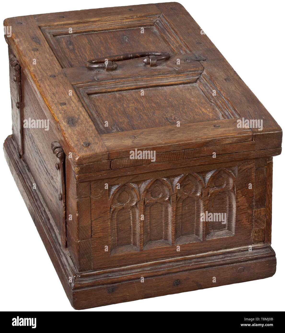 A late Gothic Rhenish casket, circa 1540 Oak wood with fine age patina. Rectangular body in frame construction affixed by wooden pegs. The obverse with two panels featuring finely carved Gothic tracery, the sides with lancet windows and tracery arches. The obverse with key hole and original lock, the key replaced. Hinged lid with original band fittings and iron handle. The base and top part of the back with old additions. Size 14 x 26.5 x 16 cm. historic, historical, handicrafts, handcraft, craft, object, objects, stills, clipping, clippings, cut, Additional-Rights-Clearance-Info-Not-Available Stock Photo