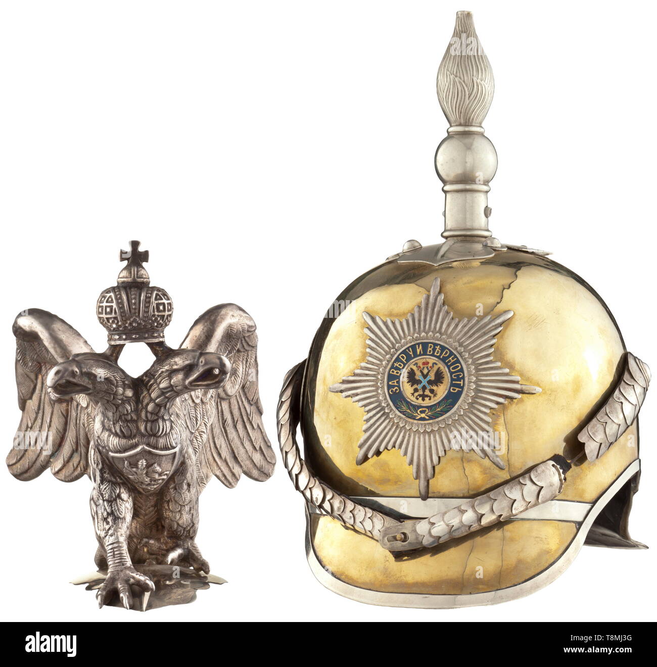 A Russian helmet for enlisted men of the Life Guard H.R.H. Cuirassier Regiment or of the Regiment Kavalergardsky, circa 1910 Tombac skull with nickel-plated service spike. Emblem in the form of the star of the Order of St. Andrew, centre with small sections painted over. Convex silver-plated chinscales (one link missing), metal cockade. Lining of the peak and sweatband of black leather replaced. The helmet struck on the inside with the number '311' and abbreviation 'III, 13 B'. Including helmet eagle (possibly original) featuring an added base pl, Additional-Rights-Clearance-Info-Not-Available Stock Photo