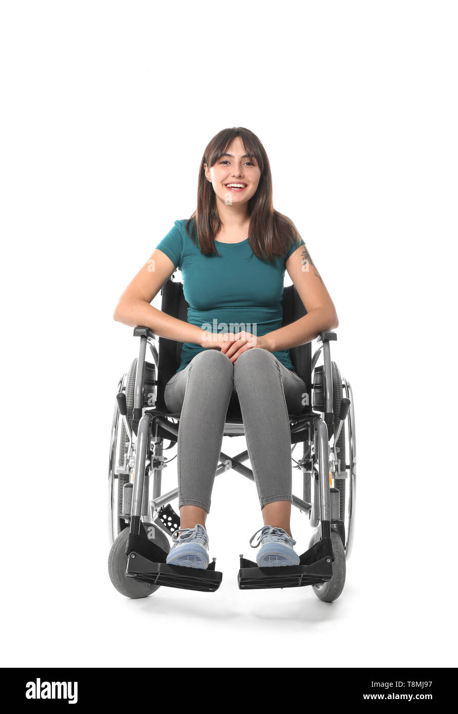 Happy young woman in wheelchair on white background Stock Photo - Alamy