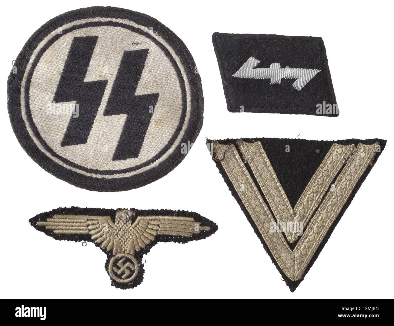 Insignia of a Dutch volunteer of the Waffen-SS A right collar patch (hand-embroidered) for NCOs in the 23rd SS Volunteer Panzergrenadier Division 'Nederland', a sports shirt emblem (woven), a sleeve eagle (machine-embroidered) and a chevron for a Rottenführer. historic, historical, 20th century, 1930s, 1940s, Waffen-SS, armed division of the SS, armed service, armed services, NS, National Socialism, Nazism, Third Reich, German Reich, Germany, military, militaria, utensil, piece of equipment, utensils, object, objects, stills, clipping, clippings, cut out, cut-out, cut-outs,, Editorial-Use-Only Stock Photo