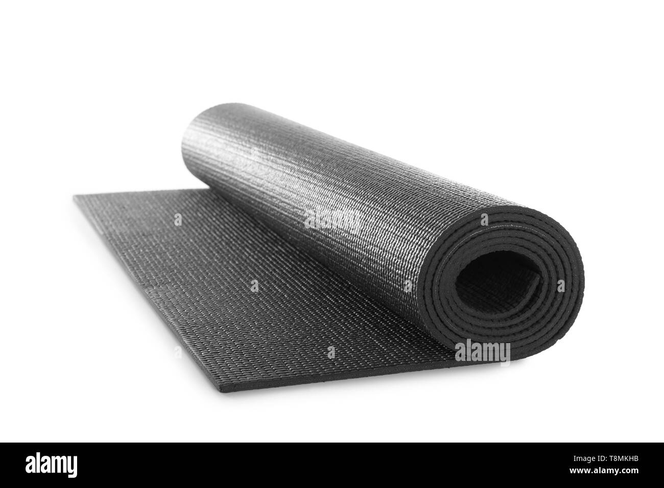 Black yoga mat on white background Stock Photo Alamy