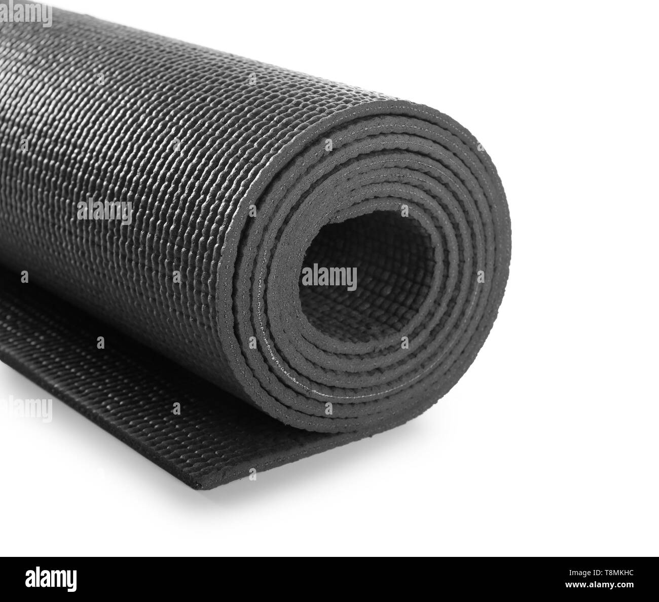 Rolled yoga mat on white background Stock Photo Alamy