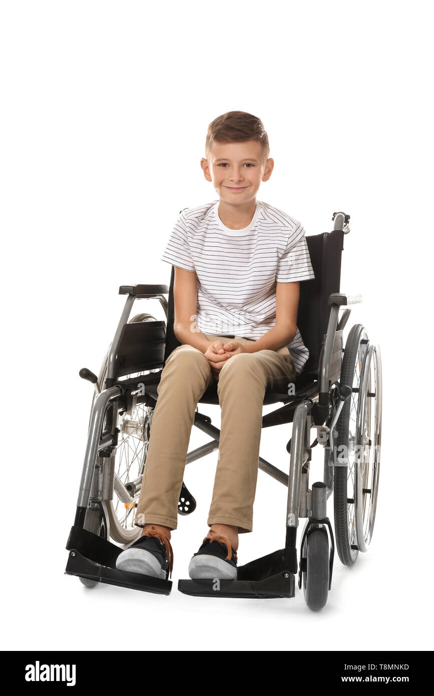 Boy in wheelchair on white background Stock Photo