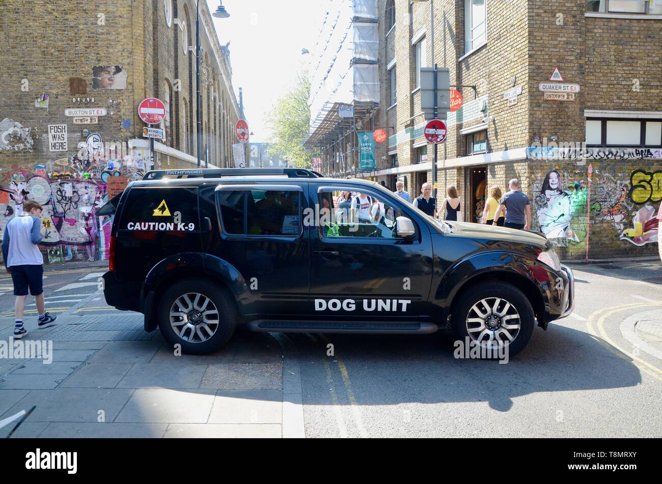private security dog unit in brick lane london Stock Photo