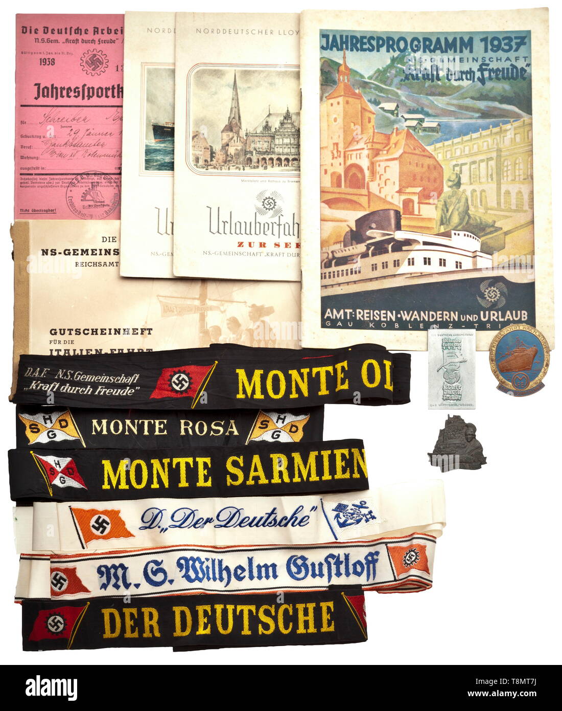 Eight cap bands from the (tr.) 'Strength Through Joy'-ships Three cap bands from the steamship 'Der Deutsche', one from 'M.S. Wilhelm Gustloff' (rare) as well as from the steamers 'Oceana, Monte Olivia, Monte Rosa, Monte Sarmiento'. The bands are all of full length (circa 95 cm) and in various base colours with different flags and symbols. Included are three badges from KdF trips and five documents including coupons and menus. historic, historical, 20th century, German Labour Front, German Labor Front, Germany, NS, National Socialism, Nazism, Third Reich, German Reich, orga, Editorial-Use-Only Stock Photo
