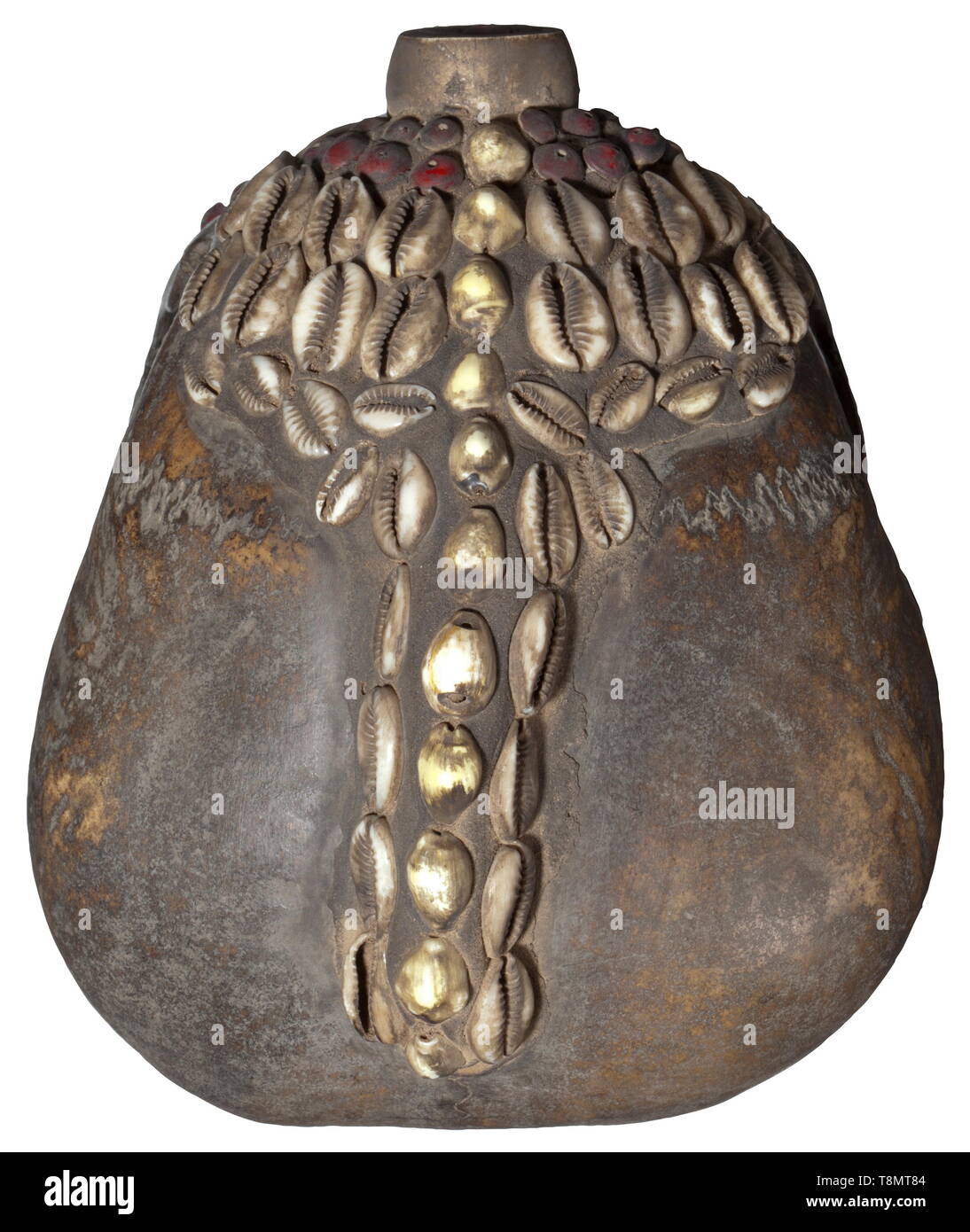 A Papua New Guinean ancestor's skull Human skull without lower jaw, the eye sockets, nasal cavity, forehead and crown decorated with seeds and cowry shells. Surfaces patinated and with signs of age. Most of the teeth of the upper jaw missing. Height 16.5 cm. historic, historical, Indonesian archipelago, Indonesia, Far East, Asia, Asian, ethnology, ethnicity, ethnic, tribal, object, objects, stills, clipping, clippings, cut out, cut-out, cut-outs, Additional-Rights-Clearance-Info-Not-Available Stock Photo