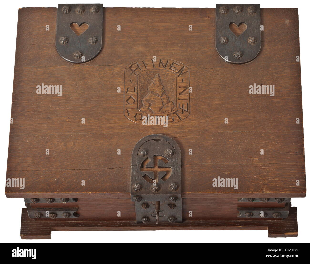 An ancestral chest Made from solid, stained oak wood, the folding lid and the base built of multiple layers, on the side inlaid runes of life and death made from non-ferrous metal, heavy, wrought-iron fittings (the lid with an openwork sun wheel, on the front side an engraved monogram). The lid with a cut rock, surrounded by the inscription 'Ahnen - Igloffstein'. Complete with lock and key. Slightly damaged in parts, signs of age. Dimensions circa 47 x 35 x 20 cm. For the storage of the family's treasure. Attic find in extremely good condition. historic, historical, 20th ce, Editorial-Use-Only Stock Photo
