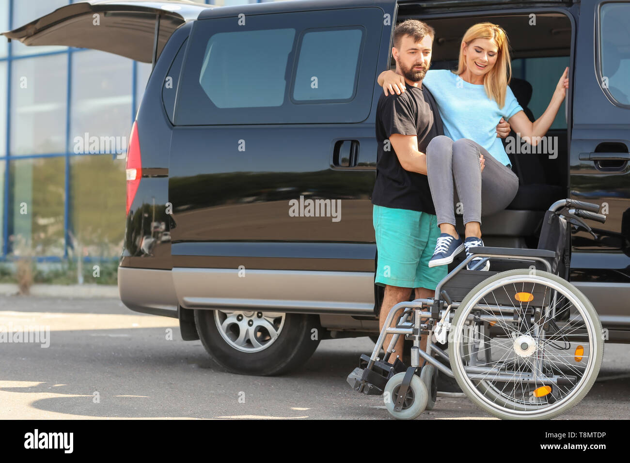 Helping handicapped hi-res stock photography and images - Alamy