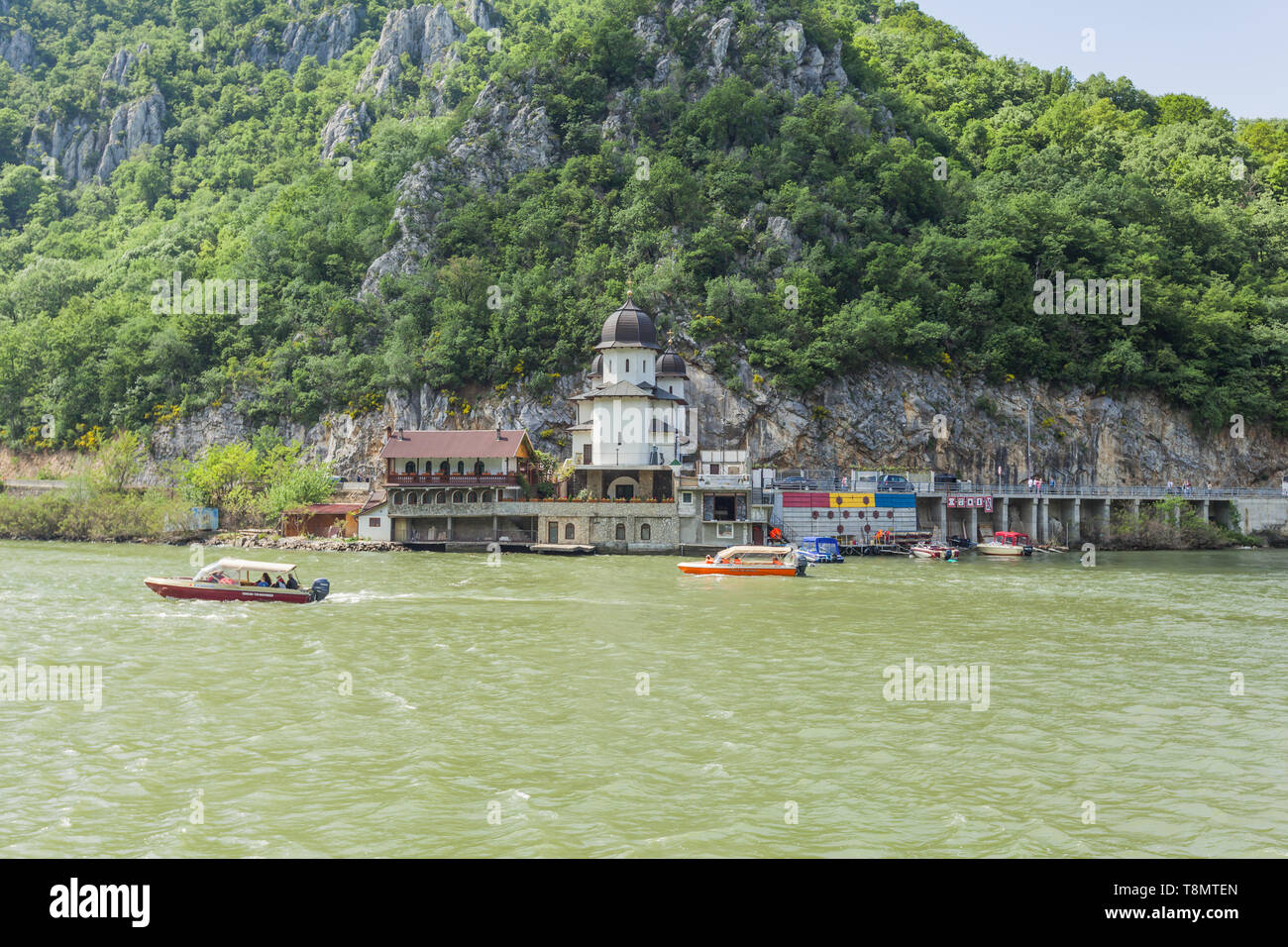 View of the orthodox Monastery Mraconia in beautiful gorge Iron Gate  (Portile din Fier) on the shore river Danube in Romania. Stock Photo