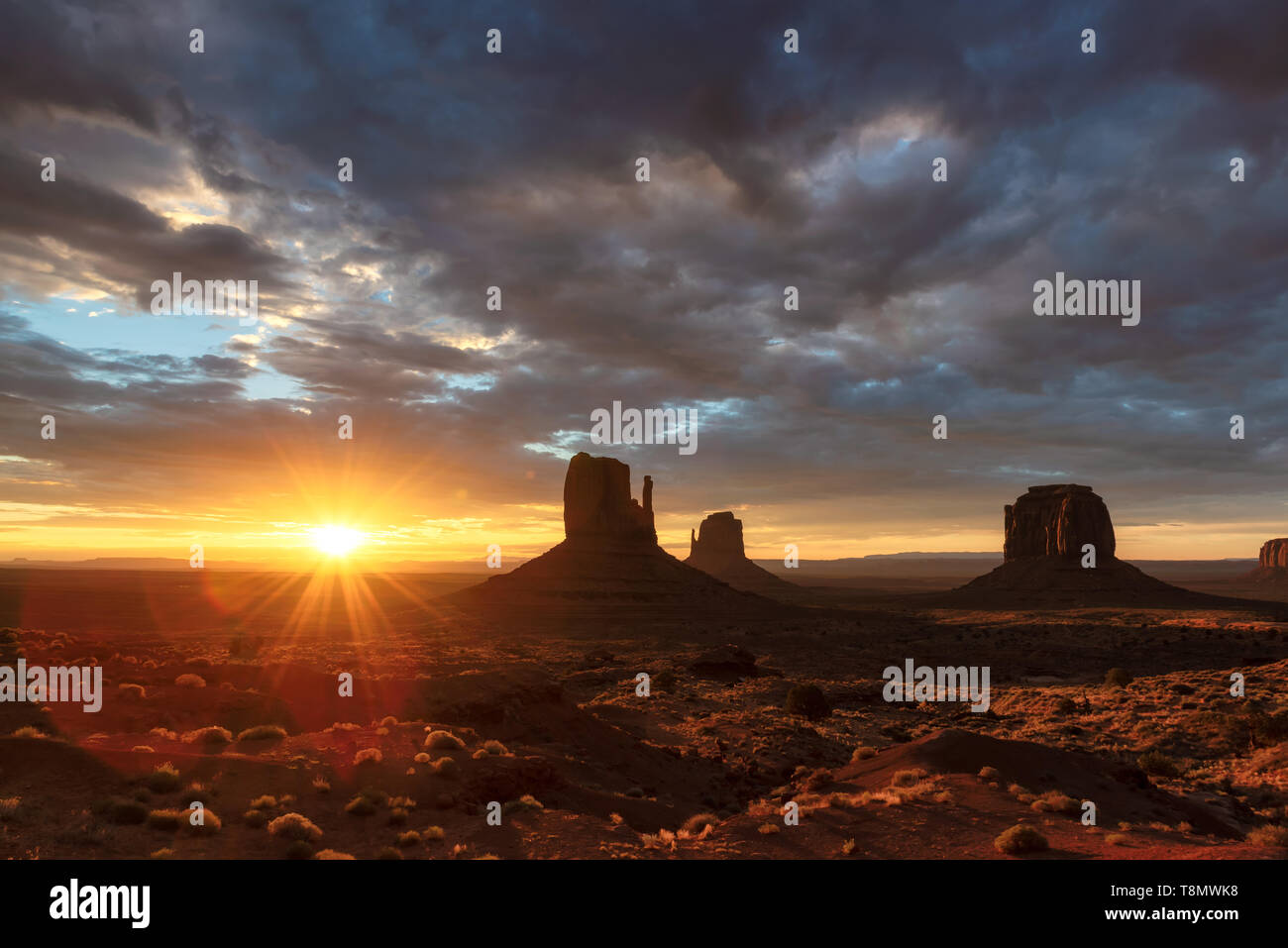 Dramatic sky at sunrise over Monument Valley in Arizona, USA. Stock Photo