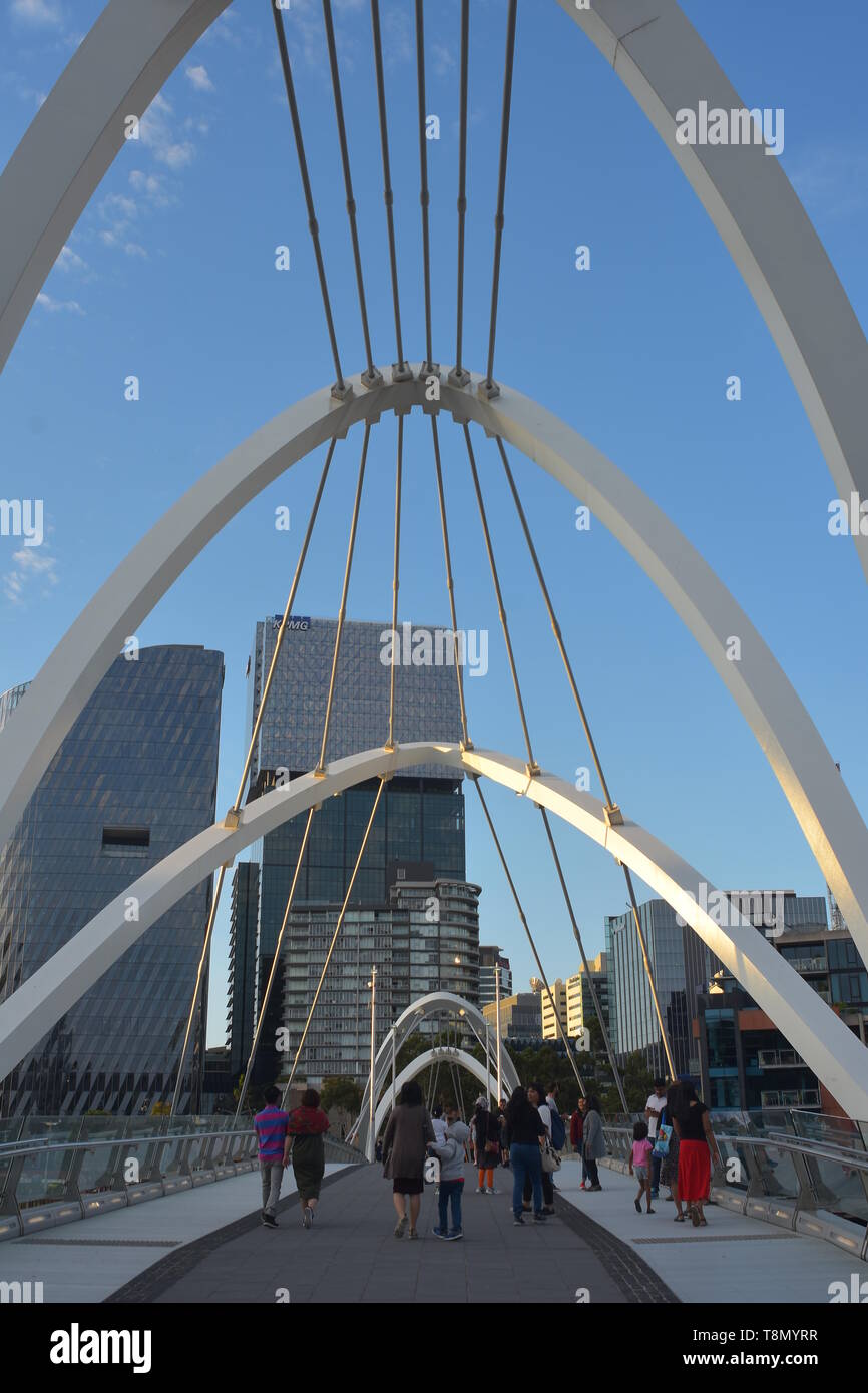 Arches and cables of pedestrian Seafarers Bridge across Yarra River in Melbourne. Stock Photo