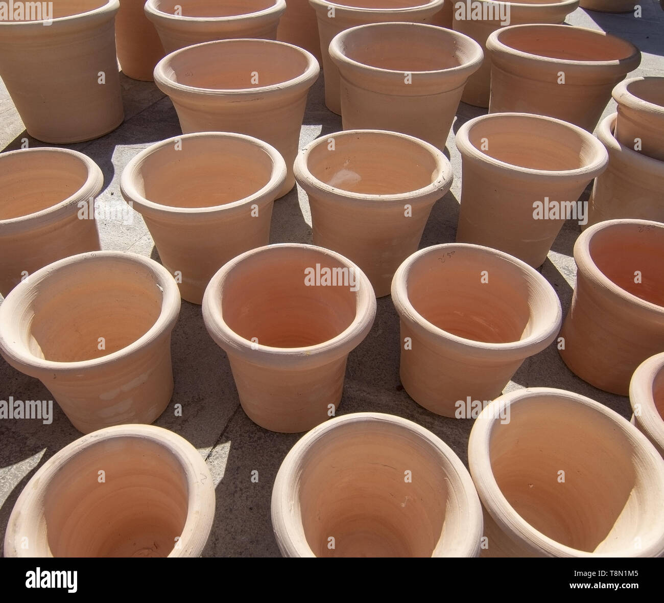 Nice newly made terracotta earthenware pots from above in Mallorca, Spain. Stock Photo
