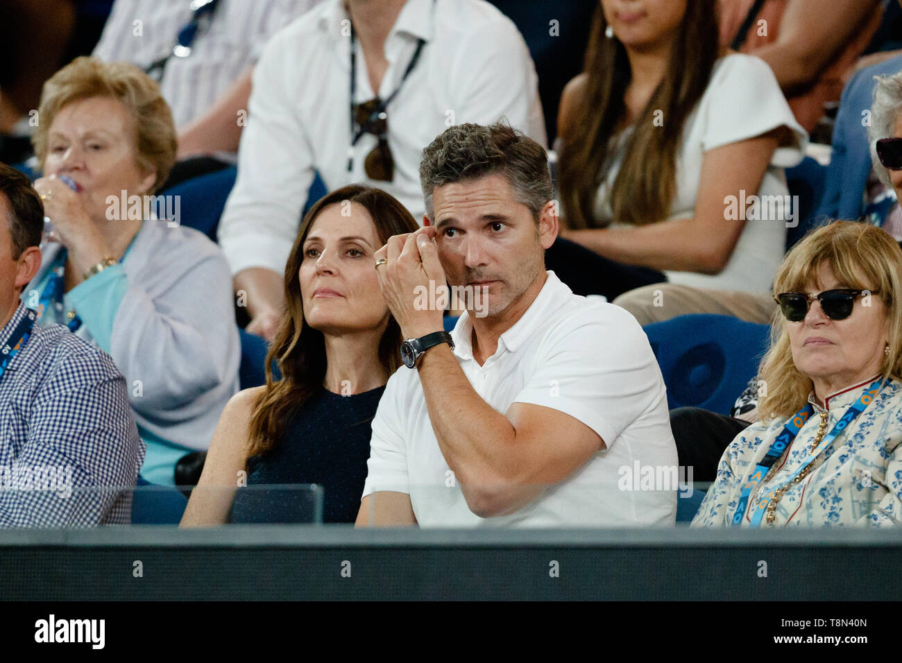 Eric Bana with wife Rebecca Gleeson watching tennis during the finals on Rod Laver Arena at the 2019 Australian Open Stock Photo