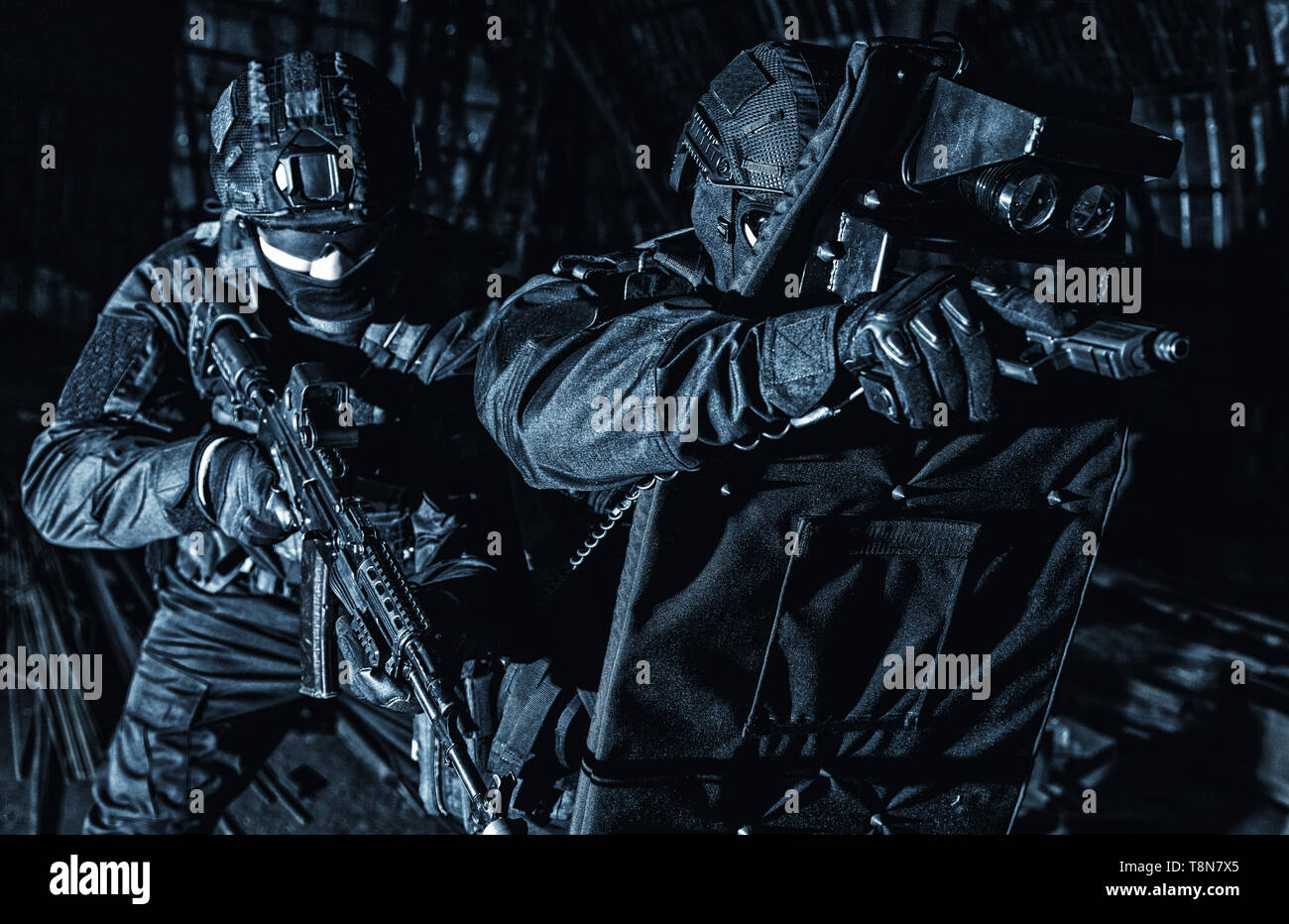Police Swat Unit Hiding Behind Ballistic Shield Stock Photo Alamy
