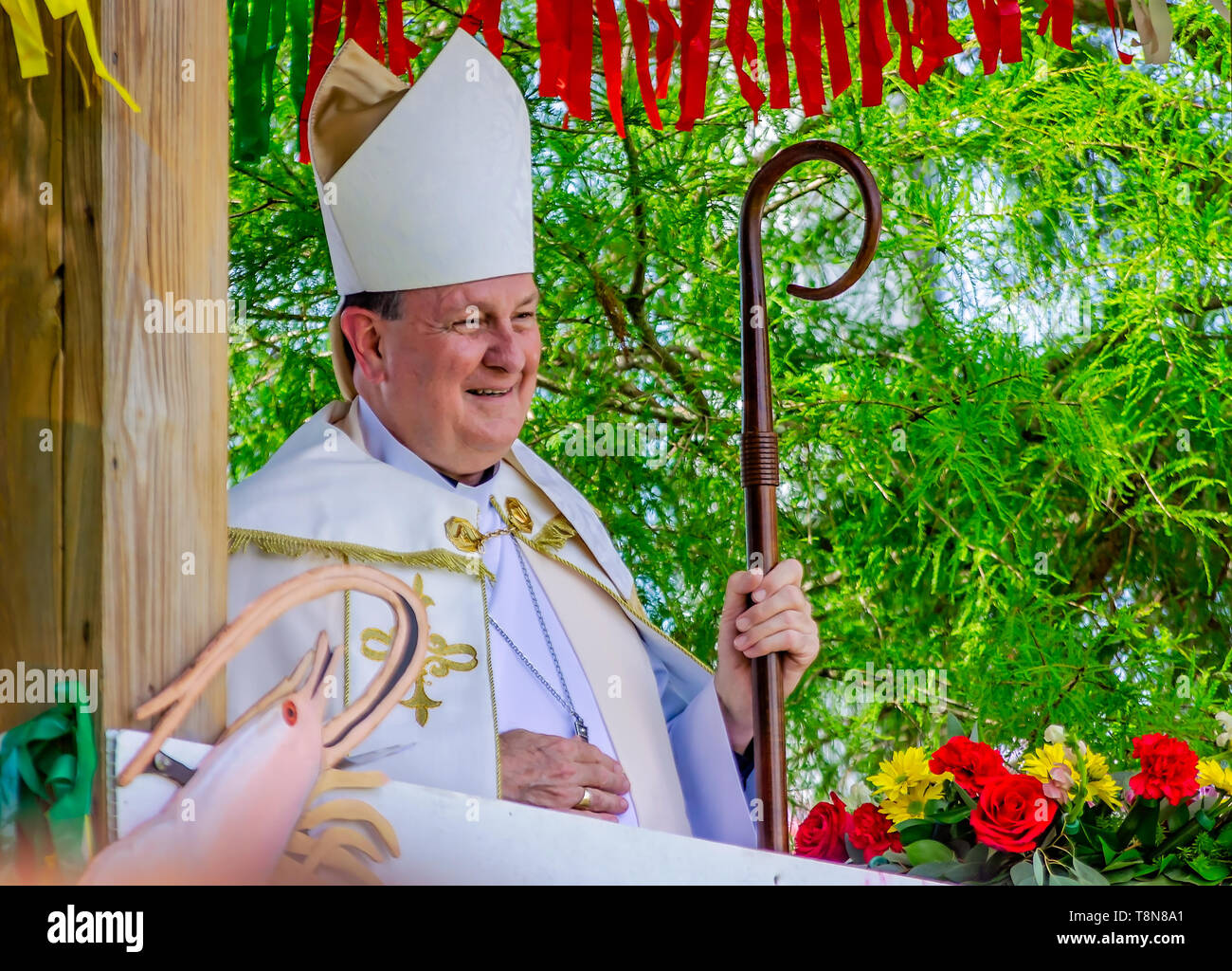 Catholic Archbishop Thomas J. Rodi waits to deliver the blessing of the boats during the 70th annual Blessing of the Fleet in Bayou La Batre, Alabama. Stock Photo
