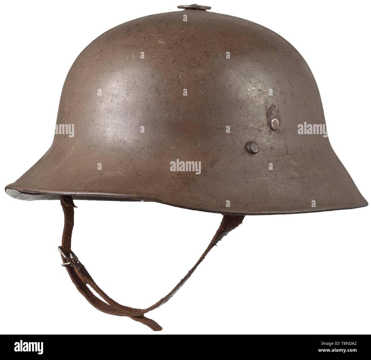 An Austrian steel helmet, Berndorf system The exterior repainted in brown  with attached lining (one double rivet) following the German model and  separately riveted flaps for the attachment of the chin strap.