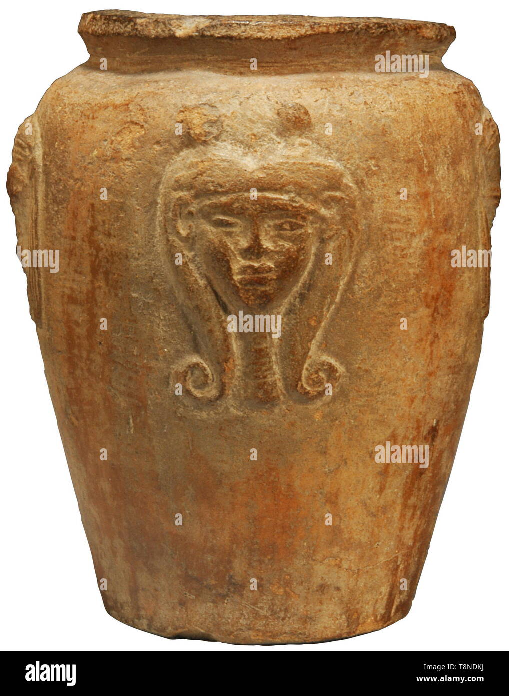 An Egyptian New Kingdom pottery jar, XIXth Dynasty, 1295 - 1070 BC Molded with four heads of deities imitating amulets, including two heads of Hathor, her hair centrally parted and terminating in curls, wearing a collar on her long neck alternating with the cow-headed Hathor, wearing a similar wig. Height 11 cm. Provenance: English private collection, Bonham's, London, May 2008, lot 57. USA-lot, see page 5. historic, historical, ancient world, Additional-Rights-Clearance-Info-Not-Available Stock Photo