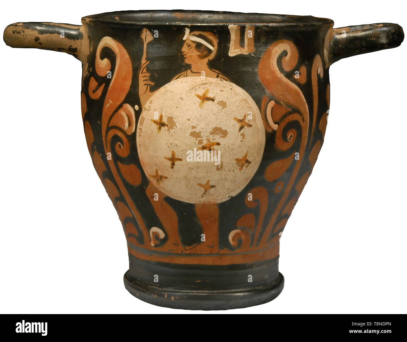 A Campanian red-figure skyphos by the frignano painter, 360 - 330 BC A warrior, wearing a white bandeau, holds a large circular white shield with ochre crosses, and a spear in his right hand, Rev: A draped youth, wearing a white bandeau, in a himation. Height 15.1 cm. Exhibited: The Borchardt Library, La Trobe University, Melbourne, Australia, April 1995 - April 2008. The Fignano Painter painted mainly vases of smal dimensions, and decorated them with single figure compositions. The use of white for outlining palmettes leaves are typical of his w, Additional-Rights-Clearance-Info-Not-Available Stock Photo