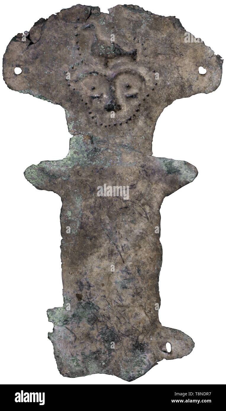 A Urartian bronze idol, 7th century BC Of flattened sheet with schematic design, the face outlined by a dotted row, the eyebrows, eyes and nose in slightly raised relief, a bird on the forehead. EX D. K. collection, Berlin, acquired in 1985. Height 15.3 cm. Cf. G. Zahlhaas, Idols. Early Images of God and Offering, Munich, exhibition, 1985, p. 53 no. 16. Provenance: Gorney & Mosch, Munich, 22 June 2007, no. 569. USA-lot, see page 5. historic, historical, ancient world, Additional-Rights-Clearance-Info-Not-Available Stock Photo