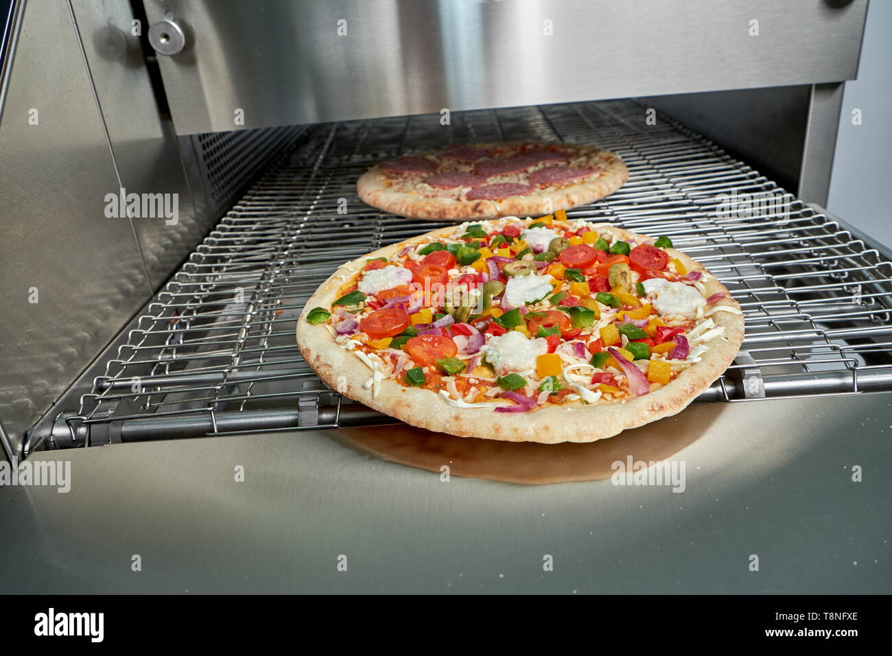 Industrial electric pizza oven with LCD display for catering. Professional  kitchen equipment Stock Photo - Alamy